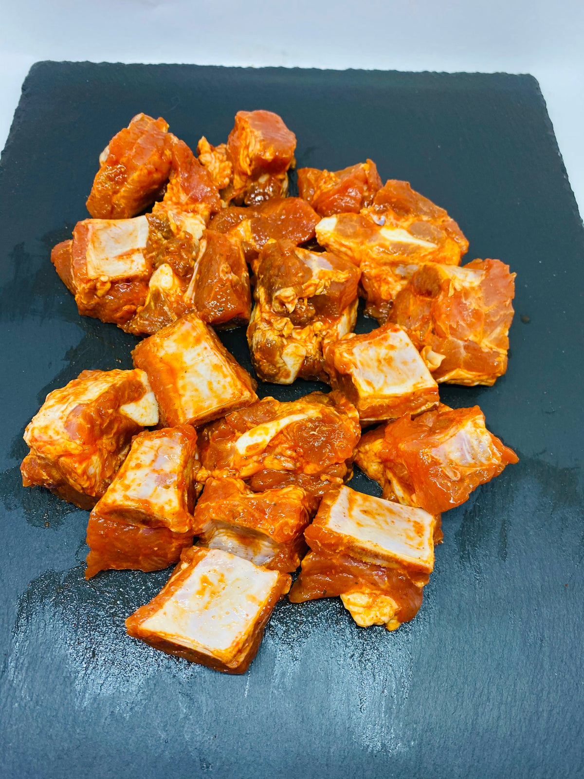 Costilla de cerdo fresca adobada, 500 gr aprox.